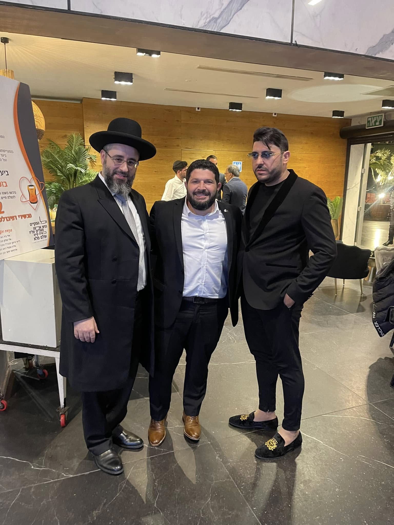 אדם שטרית, הרב גד רווח ונציג נוסף באירוע הוקרה למתנדבי איחוד הצלה